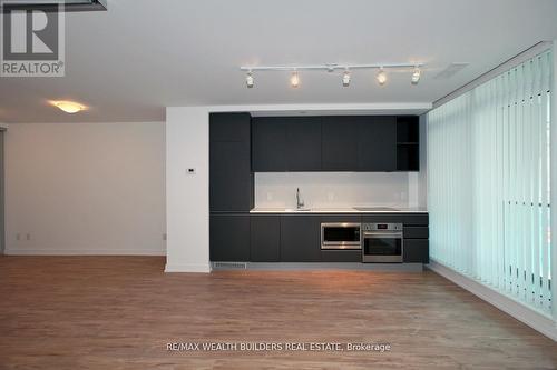 210 - 377 Madison Avenue, Toronto, ON - Indoor