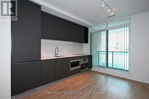 210 - 377 Madison Avenue, Toronto, ON - Indoor