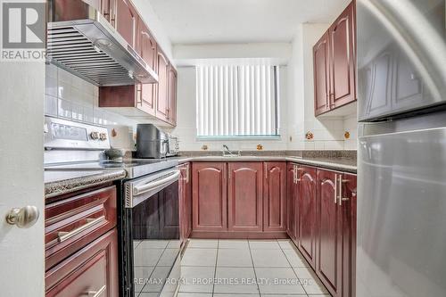 903 - 10 Tapscott Road, Toronto, ON - Indoor Photo Showing Kitchen