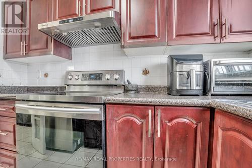 903 - 10 Tapscott Road, Toronto, ON - Indoor Photo Showing Kitchen