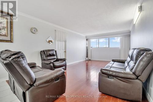 903 - 10 Tapscott Road, Toronto, ON - Indoor Photo Showing Living Room