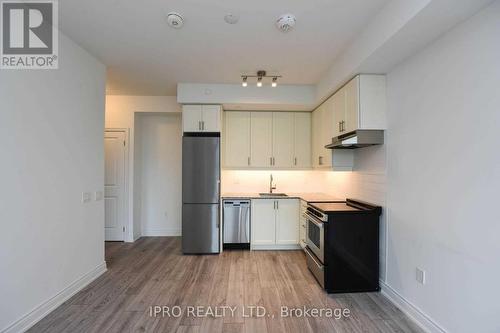 223 - 1050 Main Street E, Milton, ON - Indoor Photo Showing Kitchen With Stainless Steel Kitchen