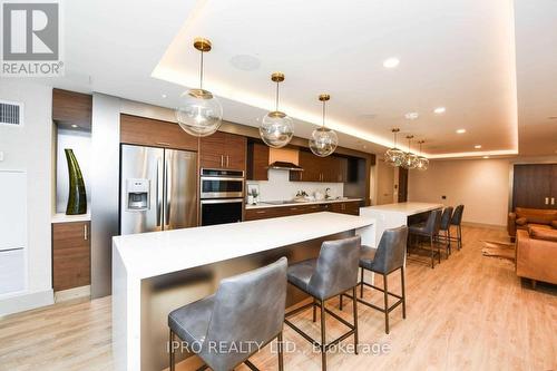 223 - 1050 Main Street E, Milton, ON - Indoor Photo Showing Kitchen With Stainless Steel Kitchen With Upgraded Kitchen