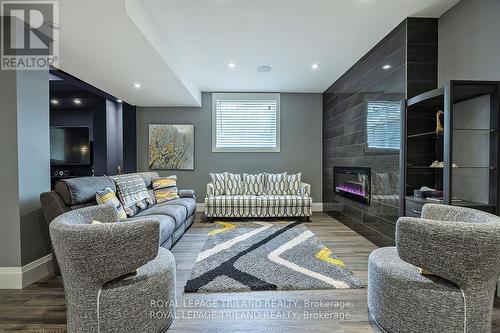 6584 French Avenue, London, ON - Indoor Photo Showing Living Room With Fireplace