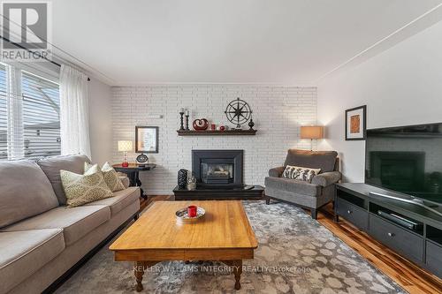 887 Notre Dame Street, Russell, ON - Indoor Photo Showing Living Room With Fireplace