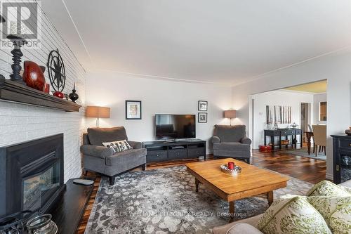 887 Notre Dame Street, Russell, ON - Indoor Photo Showing Living Room With Fireplace