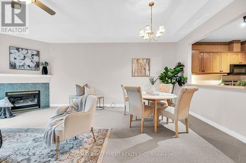 54 Greentrail Drive, Hamilton, ON - Indoor Photo Showing Dining Room With Fireplace