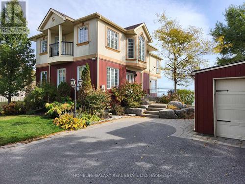 55 Cedar Crest Beach Road, Clarington, ON - Outdoor With Balcony With Facade