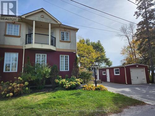 55 Cedar Crest Beach Road, Clarington, ON - Outdoor With Balcony With Facade