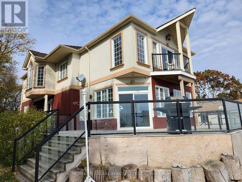 55 Cedar Crest Beach Road, Clarington, ON - Outdoor With Balcony With Facade