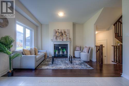 4 Poole Street, Brantford, ON - Indoor Photo Showing Living Room With Fireplace