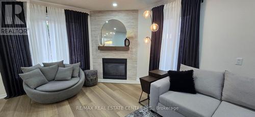 210 Dorchester Drive, Grimsby, ON - Indoor Photo Showing Living Room With Fireplace