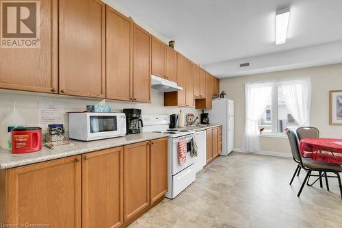 760 Woodhill Drive Unit# 219, Centre Wellington, ON - Indoor Photo Showing Kitchen