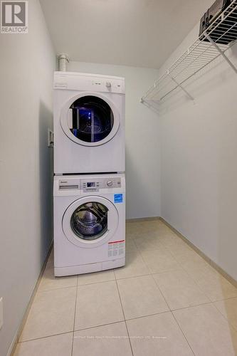 1008 - 70 Temperance Street, Toronto, ON - Indoor Photo Showing Laundry Room