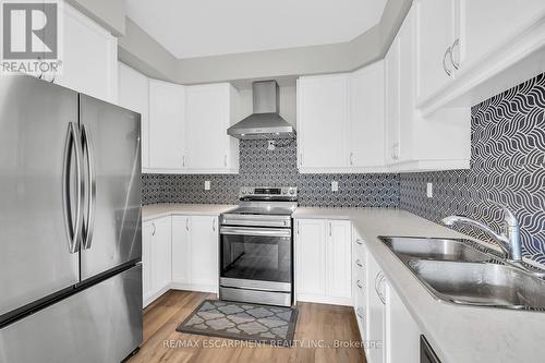 26 - 305 Garner Road W, Hamilton, ON - Indoor Photo Showing Kitchen With Double Sink