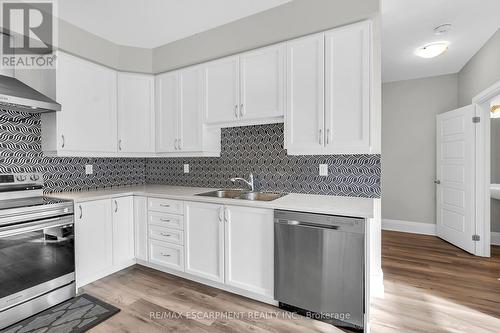 26 - 305 Garner Road W, Hamilton, ON - Indoor Photo Showing Kitchen With Double Sink