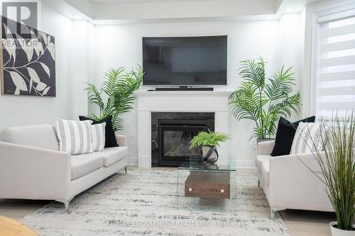 158 Agro Street, Hamilton, ON - Indoor Photo Showing Living Room With Fireplace