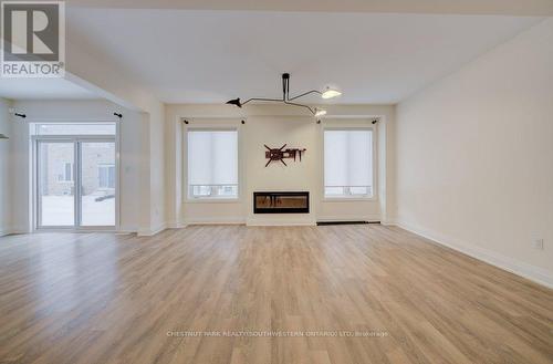 557 Veterans Drive, Brampton, ON - Indoor Photo Showing Living Room With Fireplace