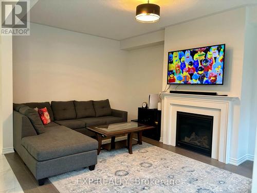 488 Black Cherry Crescent, Shelburne, ON - Indoor Photo Showing Living Room With Fireplace