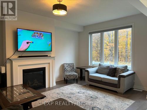 488 Black Cherry Crescent, Shelburne, ON - Indoor Photo Showing Living Room With Fireplace