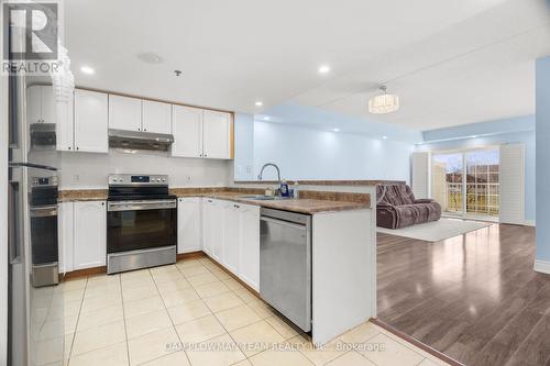 201 - 7428 Markham Road, Markham, ON - Indoor Photo Showing Kitchen With Double Sink