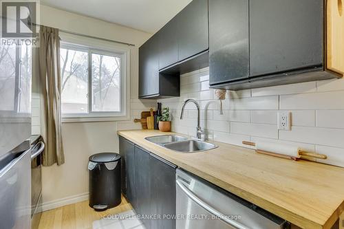 36 - 166 Southdale Road W, London, ON - Indoor Photo Showing Kitchen With Double Sink