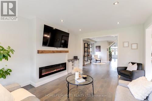 54 Hoard Avenue, New Tecumseth, ON - Indoor Photo Showing Living Room With Fireplace