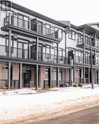 66 Wheat Lane, Kitchener, ON - Outdoor With Balcony With Facade