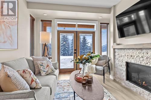 5045 Valley Drive Unit# 13, Sun Peaks, BC - Indoor Photo Showing Living Room With Fireplace