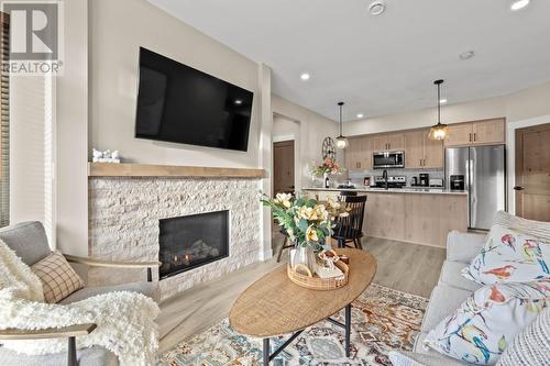 5045 Valley Drive Unit# 13, Sun Peaks, BC - Indoor Photo Showing Living Room With Fireplace