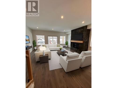 1365 Burfield Drive, Sun Peaks, BC - Indoor Photo Showing Living Room With Fireplace