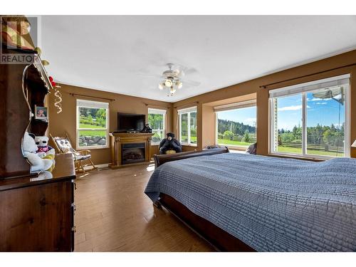 5120 Steffens Road, Merritt, BC - Indoor Photo Showing Bedroom With Fireplace