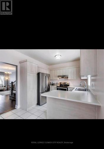 32 Starfish Court, Brampton, ON - Indoor Photo Showing Kitchen With Double Sink