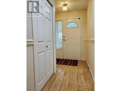 Entry area with coat closet - 1038 11 Avenue Unit# 19, Vernon, BC - Indoor Photo Showing Other Room