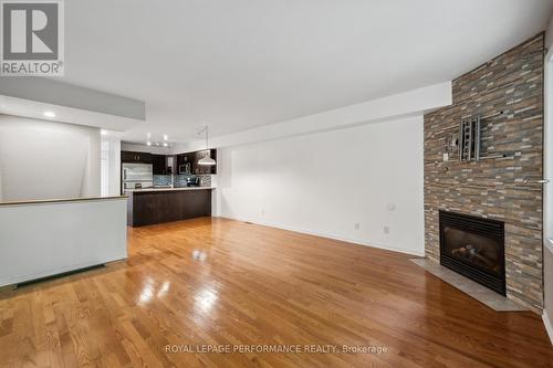 75 Strathaven Private, Ottawa, ON - Indoor Photo Showing Living Room With Fireplace