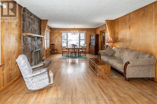 2592 Highway 141 W, Muskoka Lakes (Watt), ON - Indoor Photo Showing Living Room With Fireplace