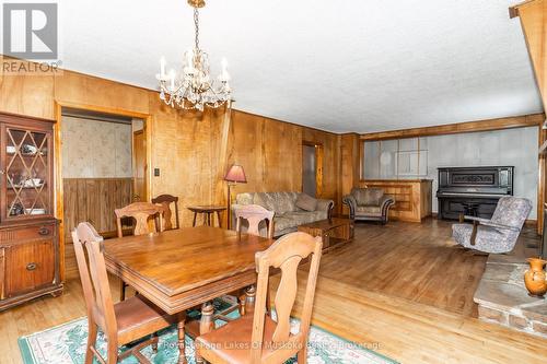 2592 Highway 141 W, Muskoka Lakes (Watt), ON - Indoor Photo Showing Dining Room With Fireplace