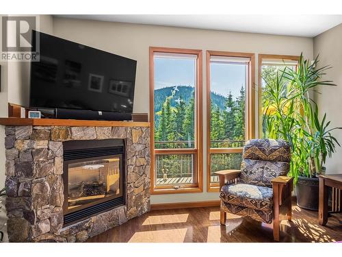 4101 Sundance Drive, Sun Peaks, BC - Indoor Photo Showing Living Room With Fireplace