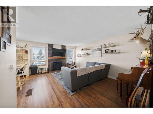 249 Hollyburn Drive, Kamloops, BC - Indoor Photo Showing Living Room With Fireplace