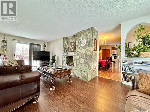 54 Alexandra Avenue, Yorkton, SK - Indoor Photo Showing Living Room With Fireplace