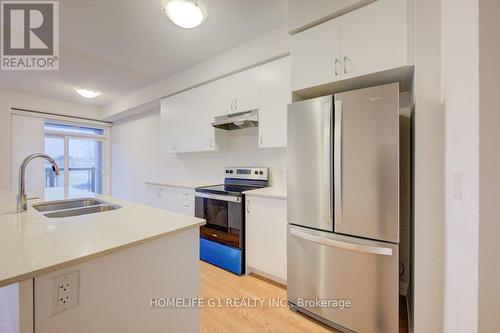 611 - 585 Colborne Street E, Brantford, ON - Indoor Photo Showing Kitchen With Double Sink With Upgraded Kitchen