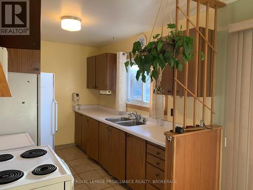 180 Elm Street, Gananoque, ON - Indoor Photo Showing Kitchen With Double Sink