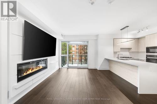 305 - 3 Southvale Drive, Toronto, ON - Indoor With Fireplace