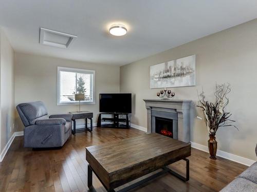 Den - 1040 Rue D'Amboise, Saint-Jérôme, QC - Indoor Photo Showing Living Room With Fireplace