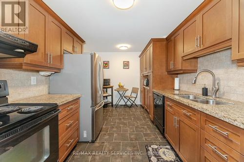 16 Montrose Place, Brampton, ON - Indoor Photo Showing Kitchen With Double Sink