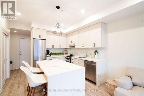 417 - 10 Esplanade Lane, Grimsby, ON - Indoor Photo Showing Kitchen With Stainless Steel Kitchen