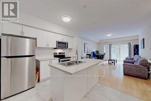 208 - 344 Florence Drive, Peterborough, ON - Indoor Photo Showing Kitchen With Double Sink