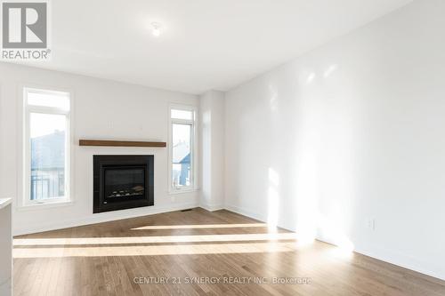 87 Bon Temps Way, Ottawa, ON - Indoor Photo Showing Living Room With Fireplace