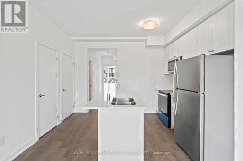 1502 - 160 Densmore Road, Cobourg, ON - Indoor Photo Showing Kitchen With Double Sink