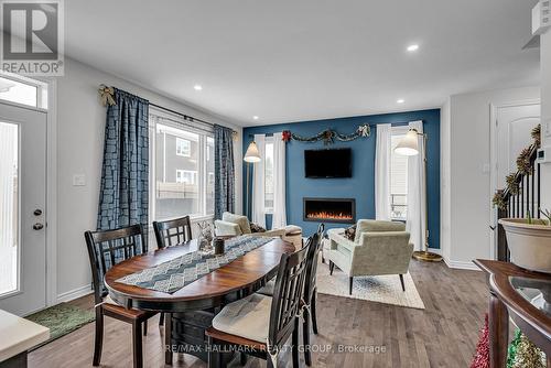 154 Aubrais Crescent, Ottawa, ON - Indoor Photo Showing Dining Room With Fireplace